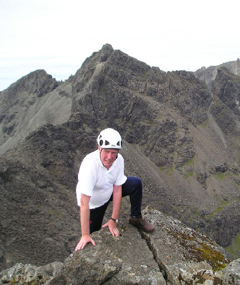 John Reaching the Summit of Sgurr Dubh Mor